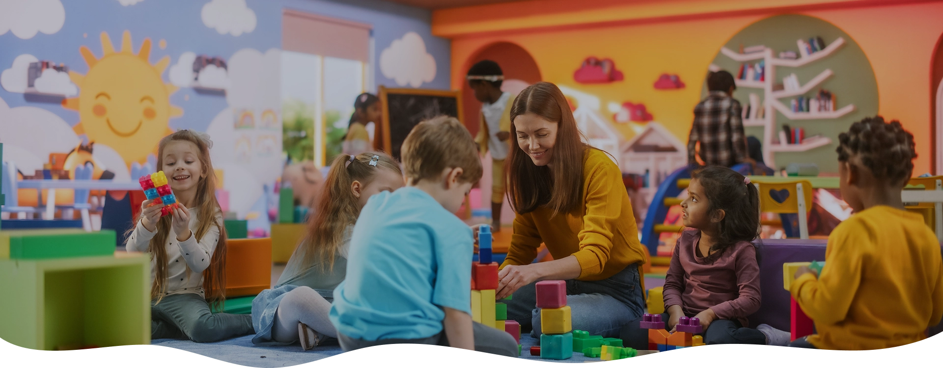kids playing with teachers