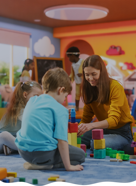 kids playing with teacher