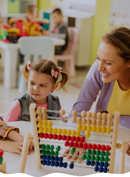 kids plying with teacher